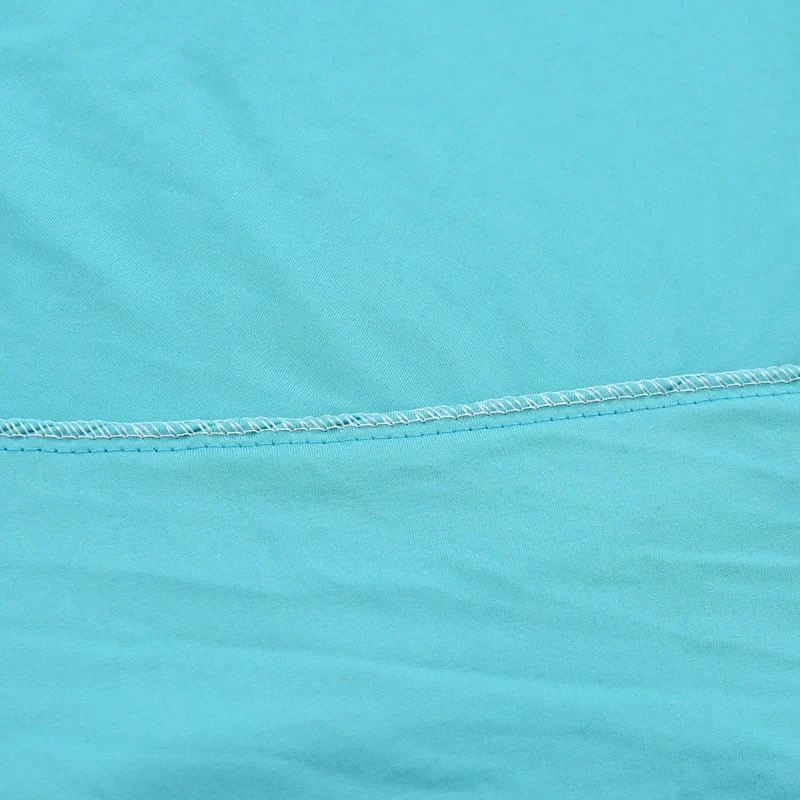 Housse extensible Turquoise pour Coussin de Canapé