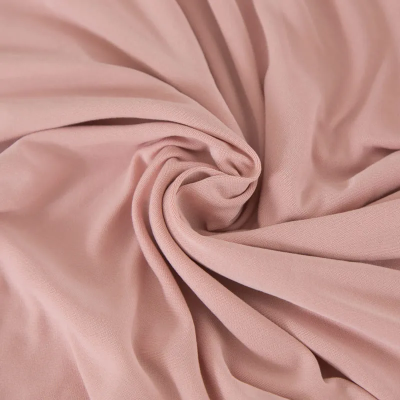 Housse extensible Rose poudré pour Coussin de Canapé