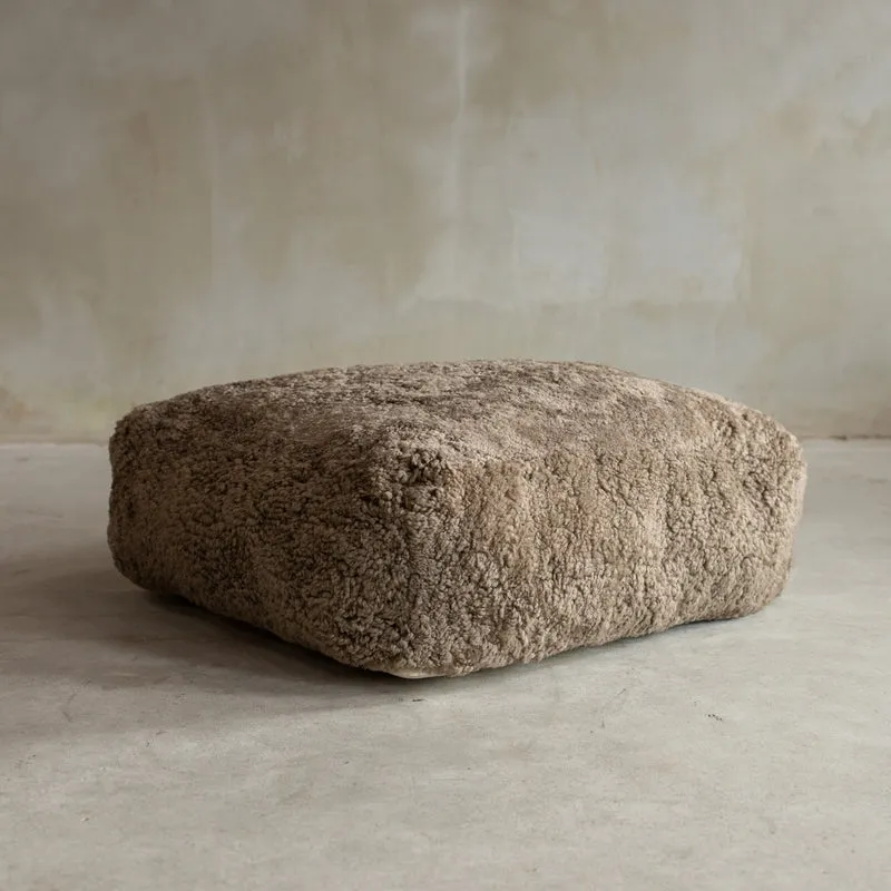 Coussin de sol peau de mouton bouclée sahara