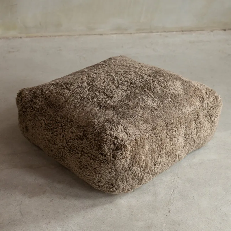 Coussin de sol peau de mouton bouclée sahara