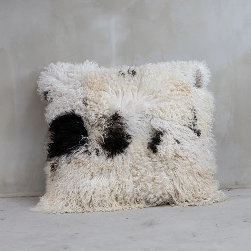 Coussin XXL peau de mouton bouclée