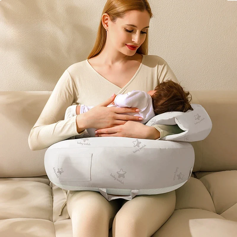 Coussin d'allaitement avec un support de bras