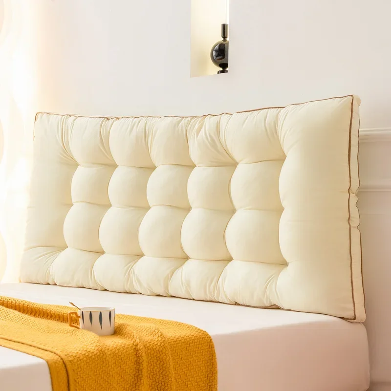 Gros coussin tête de lit