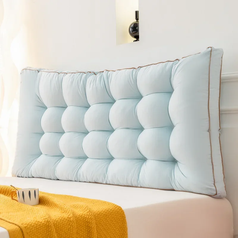 Gros coussin tête de lit