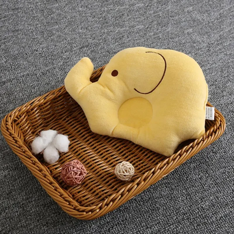 Coussin anti tête plate bébé éléphant