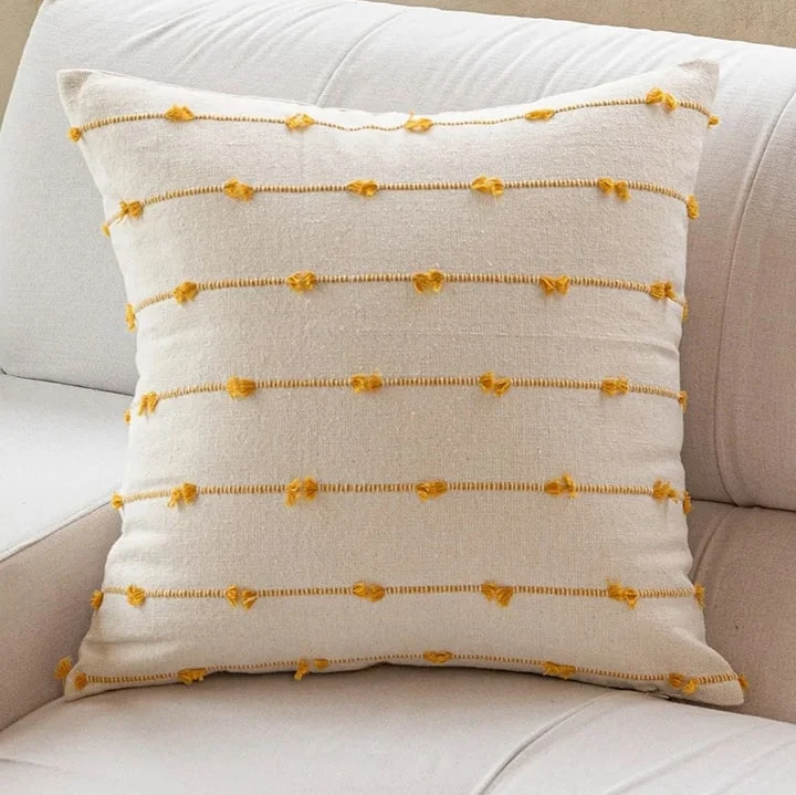 Coussin déco canapé avec rayures brodées