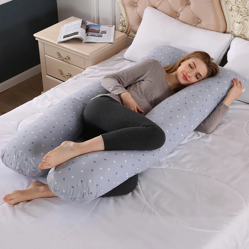 Coussin grossesse avec motifs d'étoiles