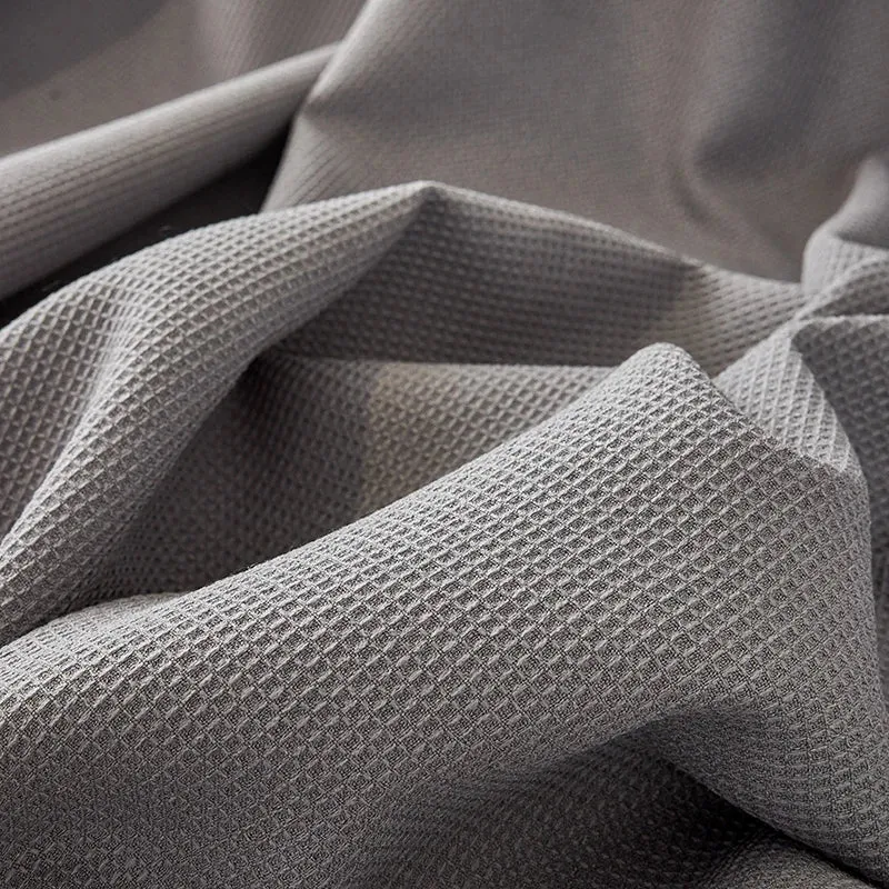 Jeté de canapé imperméable texture gaufrée