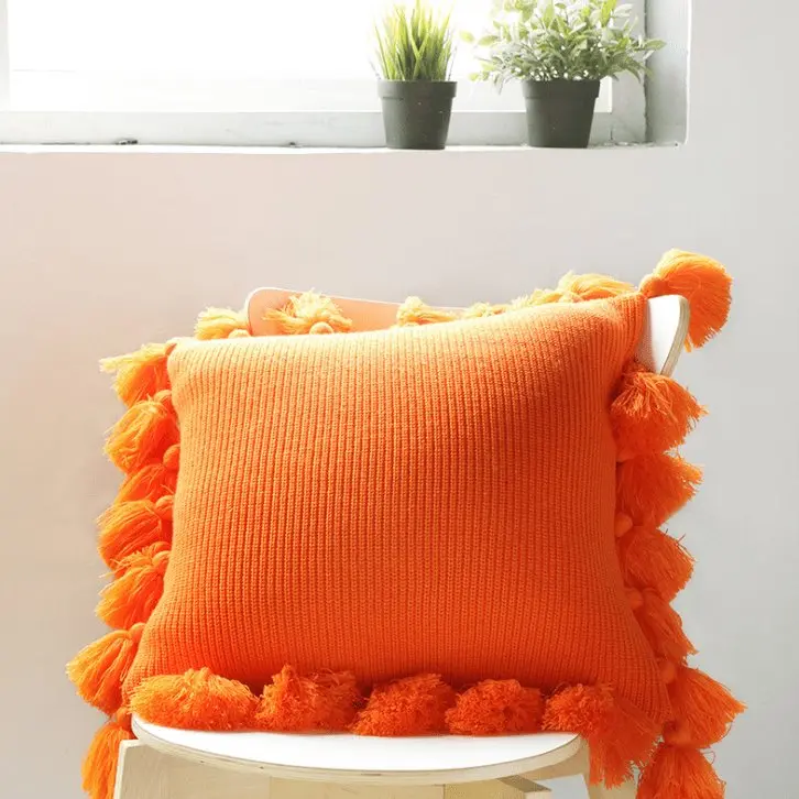 Housse de coussin tricotée bohème avec franges