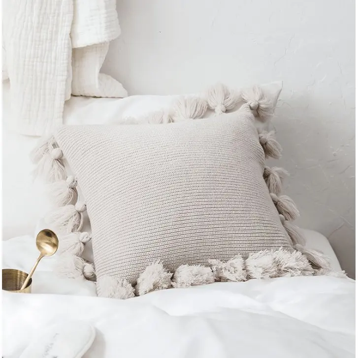 Housse de coussin tricotée bohème avec franges